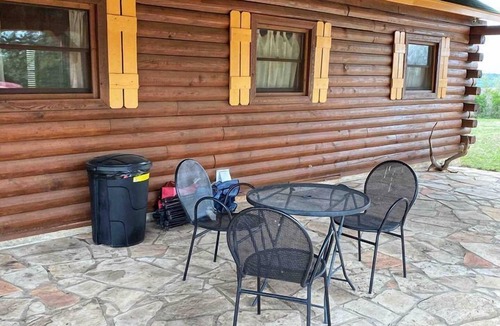 Mico Cabin | Peaceful and Pet Friendly Log Cabin near Medina Lake, Perfect for a Texas Hill Country Getaway