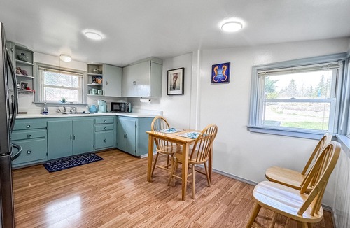 Erlands Point-Kitsap Lake Cottage | Peaceful Beachfront Cottage - Large Deck & Fire Pit - Gorgeous Views & Wildlife
