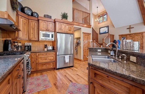 Tamarack Resort House | Peaceful Cabin with a hot tub and outdoor fireplace. Ski in ski out property.