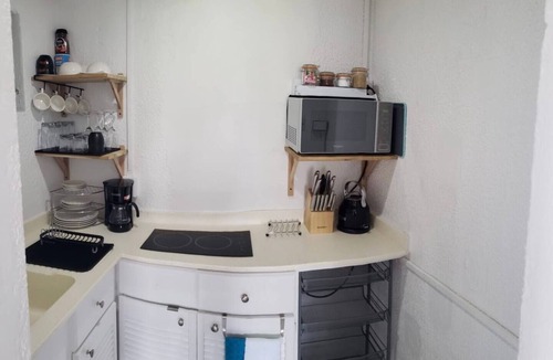 Rendezvous Apartment | Peaceful intensely clean unit overlooking tropical gardens and golf course