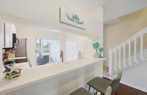 Sabal Harbour House | Peaceful Lakeside Stay with Private Screened Patio-Community Pool-Near Beaches