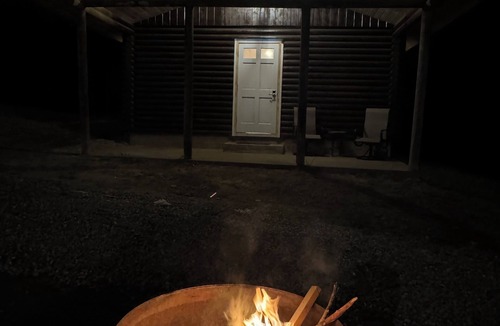 Kimbolton Cabin | Peaceful log cabin on a back gravel road with private deck and amenities of home