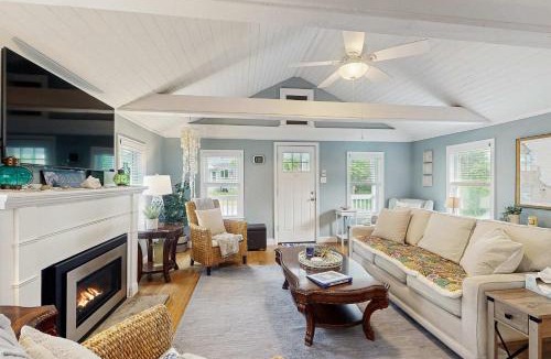 Pocasset House | Peaceful marshview escape with large sunroom AC outdoor firepit & dog friendly