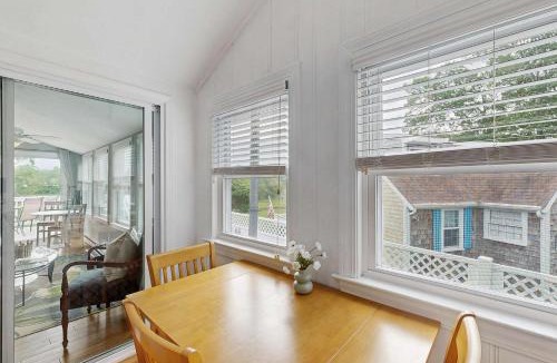 Pocasset House | Peaceful marshview escape with large sunroom AC outdoor firepit & dog friendly