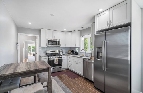 Belmont Cragin Apartment | Peaceful Oasis - Captivating Six-Bedroom Escape
