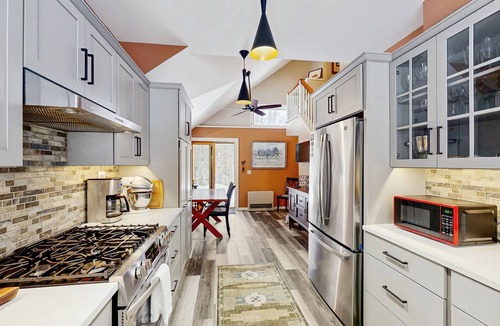 Newfane House | Peaceful riverfront house, dog-friendly, woodstove, decks, bbq, firepit, dock