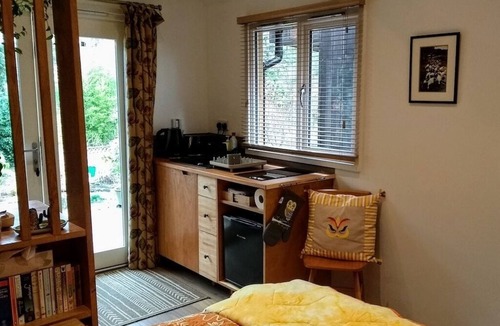 Westbury Apartment | Peaceful separate annexe with bed, kitchen, shower room and patio area.