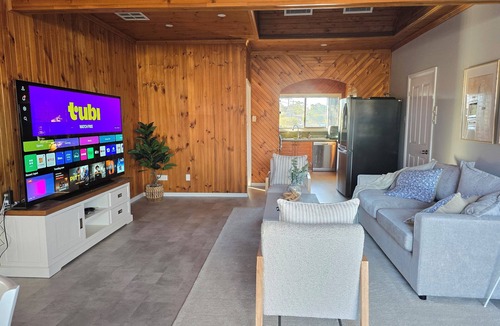 Canley Vale House | Peaceful spacious home with tranquil gardens and alfresco dining zones for year-round enjoyment