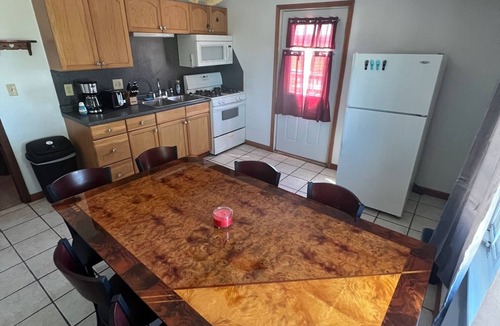 Gypsum Apartment | Pebbles Suite above Bedrock Tavern