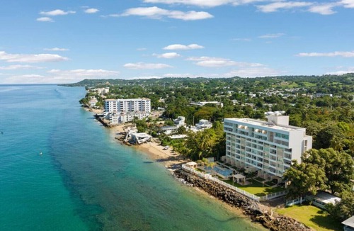 Stella Condo | Pelican Reef 703 Beachfront Penthouse with Ocean and Sunset Views
