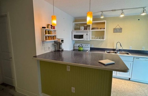 Cocoa Beach Villa | Penguins on the Beach | 2BR Steps to Beach & Downtown w/pool | Unit 1