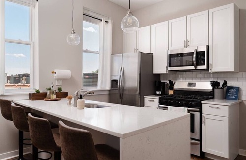 West Town Apartment | Penthouse and Private Rooftop with Skyline Views, Grill, and Fire Pit - Sleeps 6