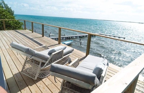 Thatch Caye Apartment | Penthouse Oceanfront Cabana