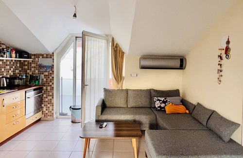 Datca City Center Apartment | Penthouse on the beach, modernly furnished. Above the roofs of Datça.
