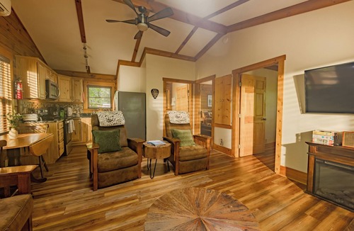 Union Hall Cabin | Perched privately on a bluff with breathtaking sunrise views over Smith Mountain Lake, this cozy remodeled 2BR/1BA log cabin offers queen memory-foam beds, well-stocked granite kitchen (farm-fresh eggs!), covered deck, stone fire pit, huge dock.