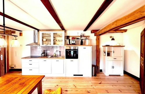 Feldberger Seenlandschaft Apartment | Perfect apartment with panoramic view, lake, jetty, boat, sauna - peace and lots of space