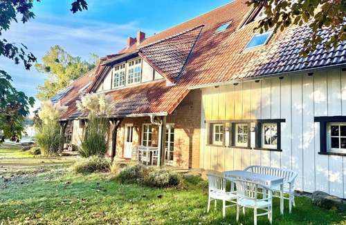 Feldberger Seenlandschaft Apartment | Perfect apartment with panoramic view, lake, jetty, boat, sauna - peace and lots of space