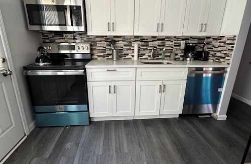 Queens Apartment | Perfect 2 bdr apt for comfortable living with parking mins from UBS stadium