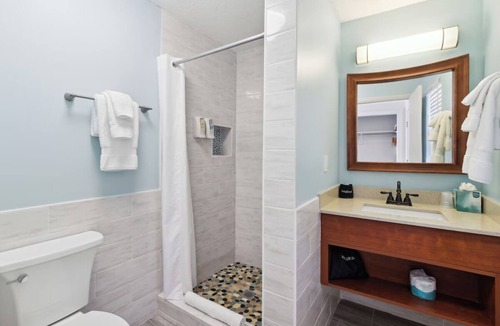 Neptune Beach Hotel | Perfect Beach Getaway: 4 Family Rooms, Outdoor Pool & Pet-Friendly