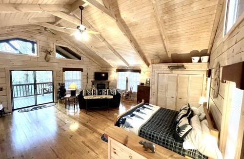 Tellico Plains Cabin | Perfectly private! Hot tub, king sized bed, grill, washer/dryer, and motorcycle friendly! Studio Cabin by RedAwning