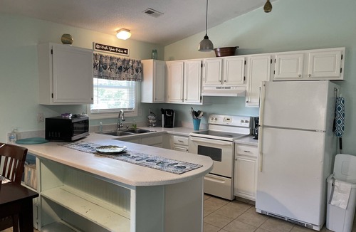 Colington House | Pet friendly 3 Bed/2 Bath Soundside retreat in OBX with Hot Tub & Enclosed yard