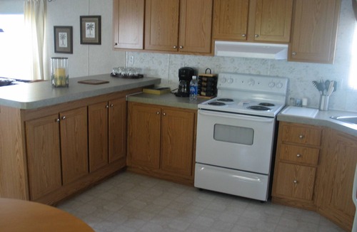 Ocean Isle Beach Cottage | Pet friendly, 3 bedroom, 2 bath, 2 piers, boat ramp, large porch, yard, waterway