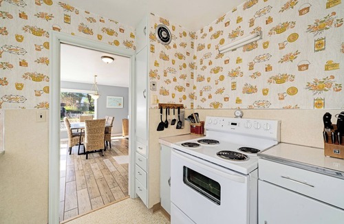 Rockaway Beach Cottage | Pet-friendly 3BR beach cottage with fenced yard, wood stove, and easy beach access.