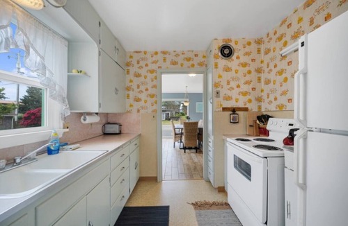Rockaway Beach Cottage | Pet-friendly 3BR beach cottage with fenced yard, wood stove, and easy beach access.