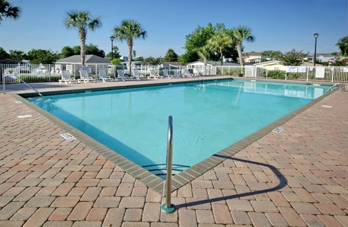 Garden City House | Pet friendly! Across from the Pools! Includes a golf cart!