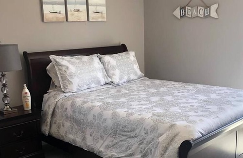 Harvey Cedars House | Pet friendly. Beach Badges. Water Front. Dock. WIFI. Single family; 3/bed; 2/bath; lagoon front