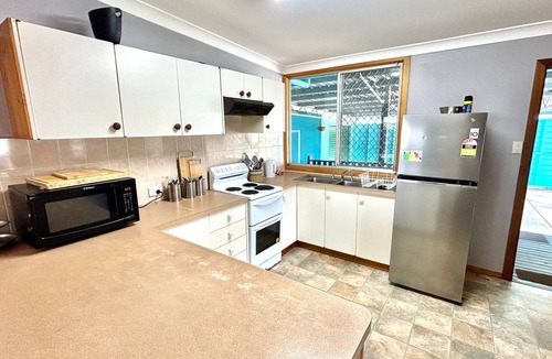 Evans Head House | Pet-friendly beach house with fenced yard, verandah, timber floors, carport, close to air beach