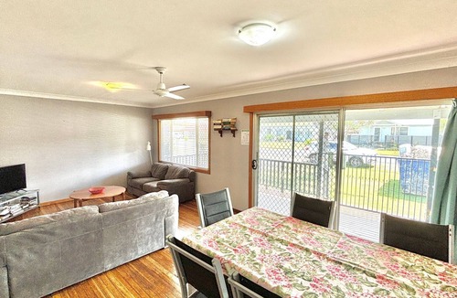 Evans Head House | Pet-friendly beach house with fenced yard, verandah, timber floors, carport, close to air beach