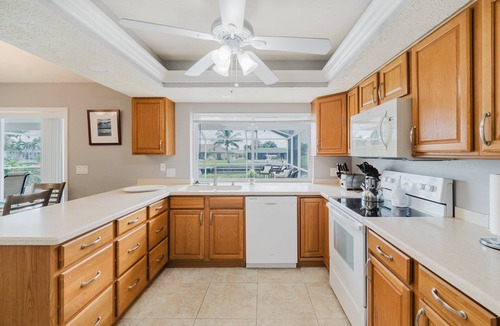 Fort Myers House | Pet friendly direct gulf access villa w/heated pool & kayaks! Villa Frances - SWFL Rentals