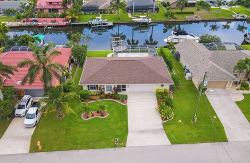 Fort Myers House | Pet friendly direct gulf access villa w/heated pool & kayaks! Villa Frances - SWFL Rentals
