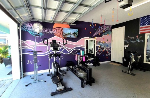 Ybor City House | Pet-Friendly Home with Hot Tub, Climbing Wall, and Gym by Mane Suites!