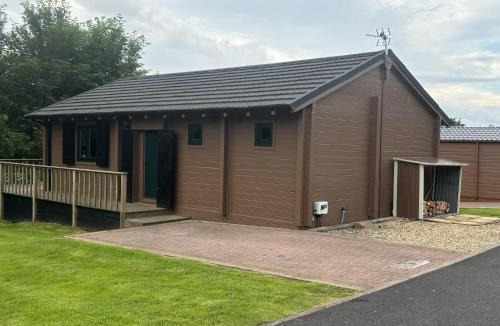 Newcastleton House | Pet Friendly - Lodge at Riverview Holiday Park