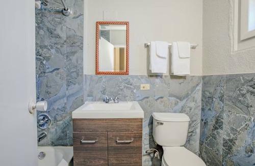 Oak Lawn Hotel | Pet-Friendly Queen Bed Room w/Fridge near Haunted Trails Family Ent. Center