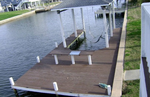 Crystal Beach Cabin | Pet-Friendly Vacation Rental with a Boat Slip on a Canal in Crystal Beach, Texas
