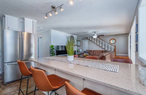 Killen House | Pet Friendly Waterfront Home + Arcade, Peloton, Boathouse, Spacious Lawn + Views