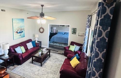 Cedar Point House | Pets welcome in a spacious 1 bedroom with a fenced in backyard and treadmill