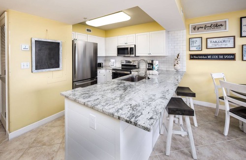 Fort Walton Beach Condo | PI 406: Sunset Shores - Take A Look! Perfect Beach Retreat with Beach Service