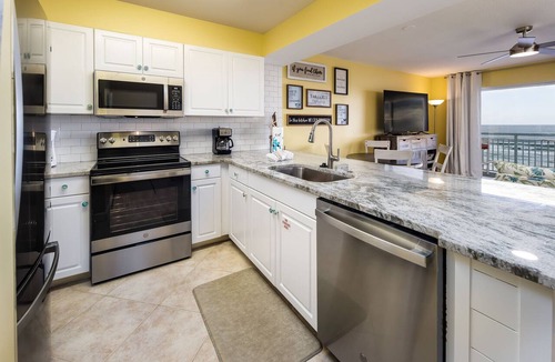 Fort Walton Beach Condo | PI 406: Sunset Shores - Take A Look! Perfect Beach Retreat with Beach Service