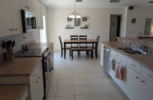 Pine Valley House | Pine Valley Palms - Charming 3-BR Waterfront Home in Rotonda with Heated Pool