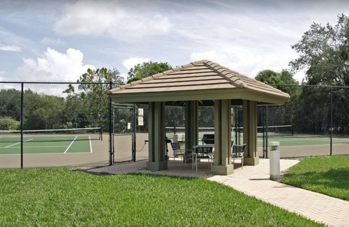 Bonita Bay Condo | Pineapples in Paradise. Relax! Escape! Enjoy! 1st fl corner w golf & sunset view