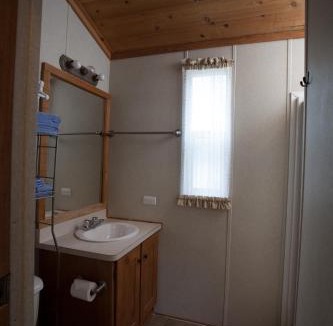 Lincoln Acres Resort | Pio Pico Camping Resort Studio Cabin 10