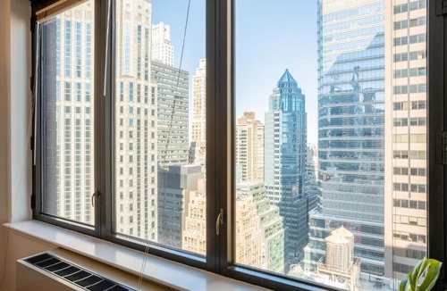 Sutton Place Apartment | Polished 2BR in E Midtown w Concierge Near Park