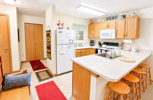 Jefferson Township Apartment | Pool Access, Fireplace & Wooded Setting