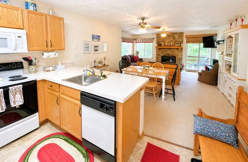 Jefferson Township Apartment | Pool Access, Fireplace & Wooded Setting