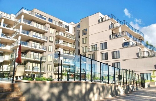 Sicamous Condo | Pool View, West Lakeview 5th Floor condo with boat slip, gym and steam room