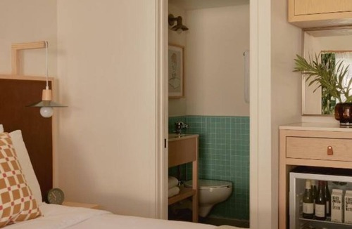 San Jacinto Hotel | Poolside Balcony + King Bed | Rooftop Bar & Walk to Attractions